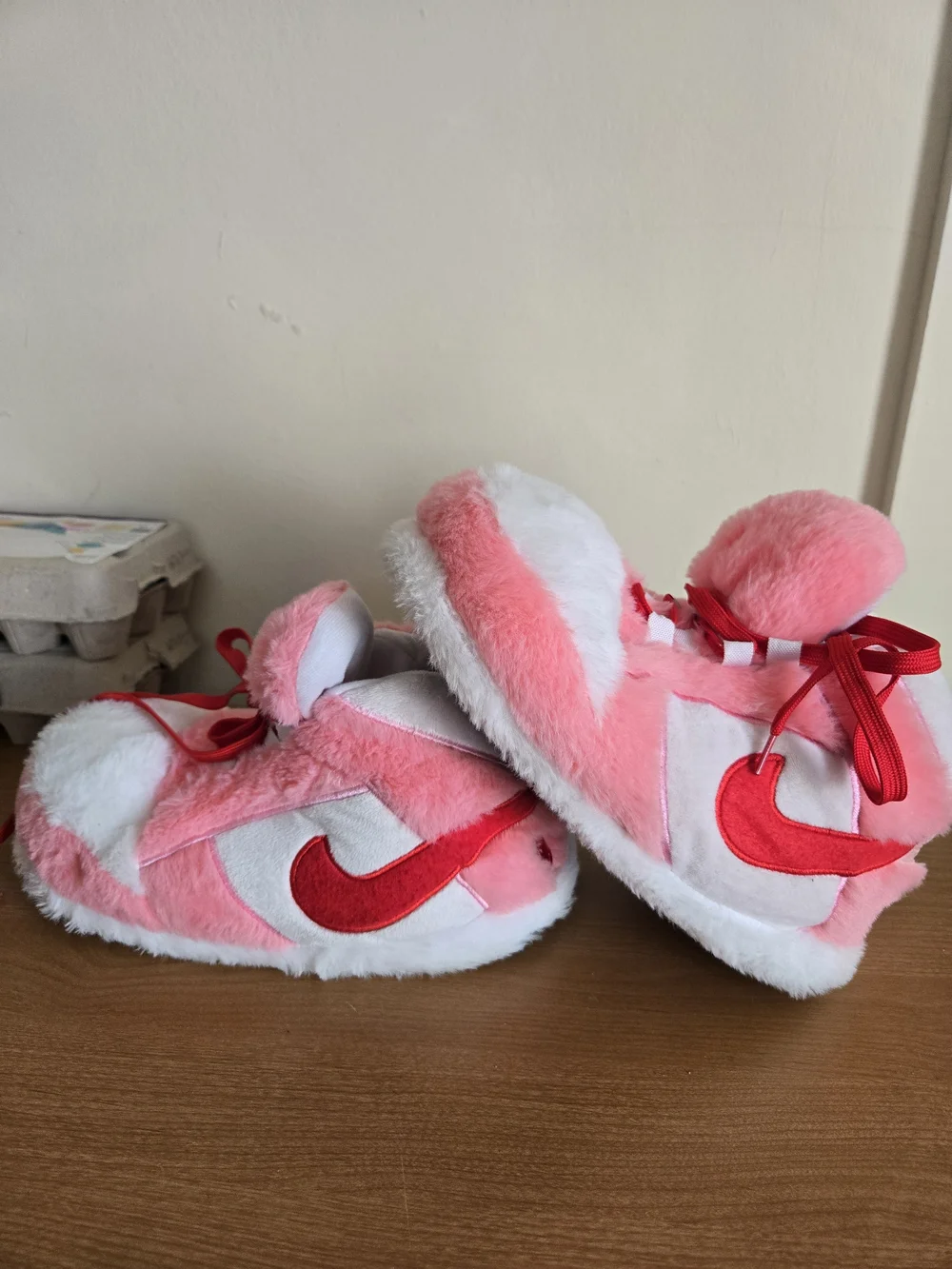 Nike Kids Pink and White Plush Slippers with Red Swoosh